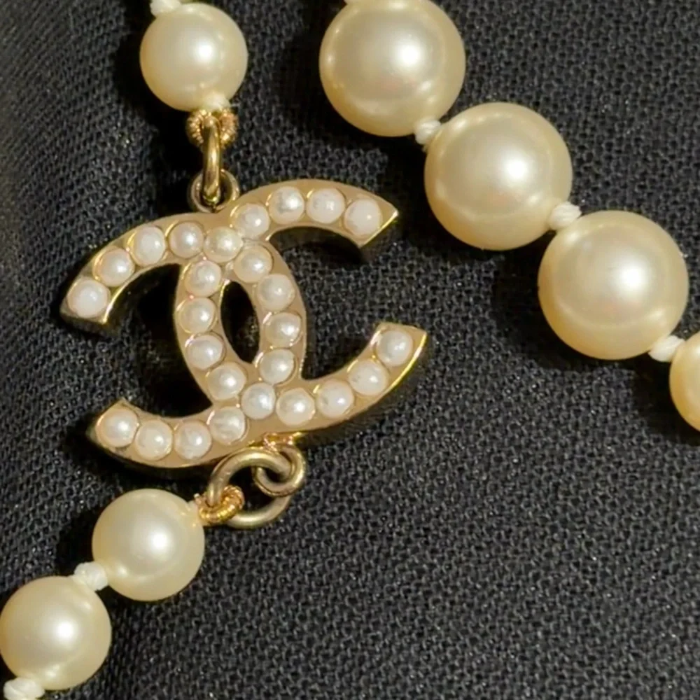 CHANEL Cream Pearl Necklace with Gold Logo - Picture 3 of 3